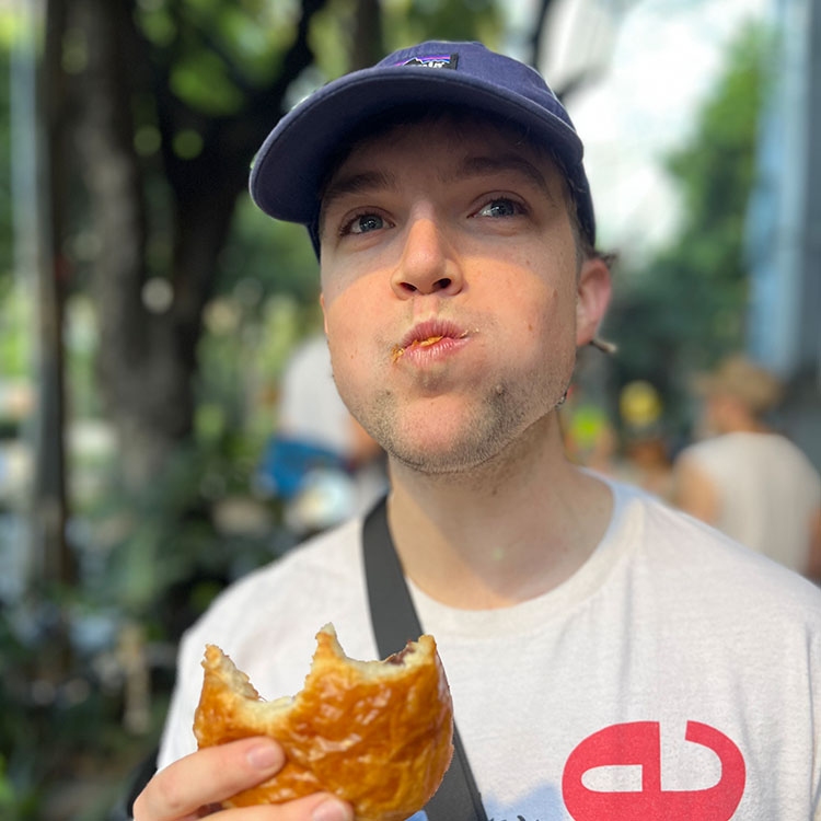 Ryan eating a pastry